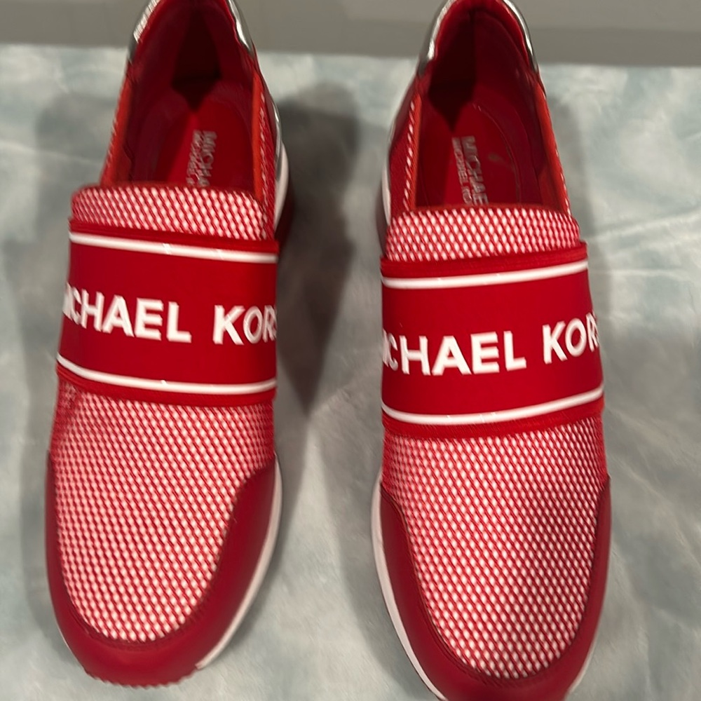 Michael Kors used red and white slip ons size 9